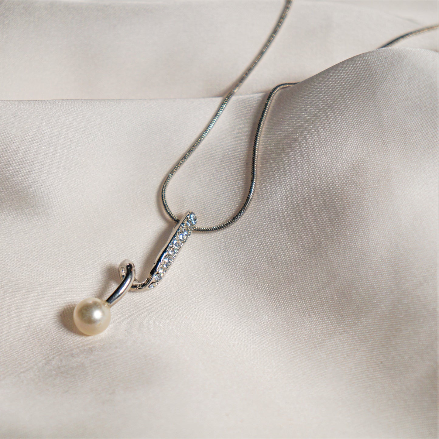 Collier July